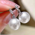 Ovelar Pearl Stud Earrings — Dainty Imitation Pearl Studs You'll Reach for Every Single Day