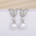 Ovelar Pearl Stud Earrings — Dainty Imitation Pearl Studs You'll Reach for Every Single Day
